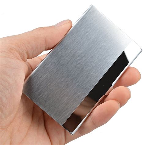 TO GO designer business card holder in steel .